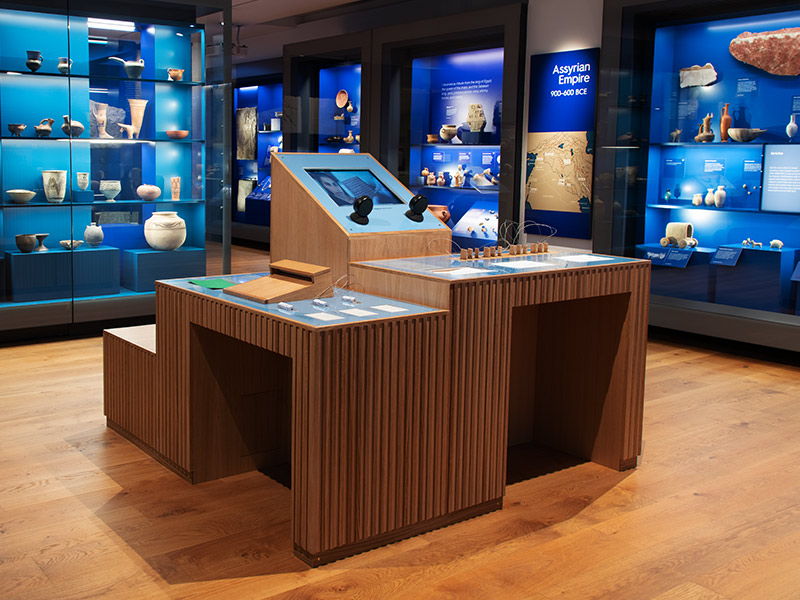 Beautifully lit display cases contain artefacts from the ancient Middle East