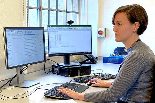 Francesca Miller works at her desktop computer in the Weston Library