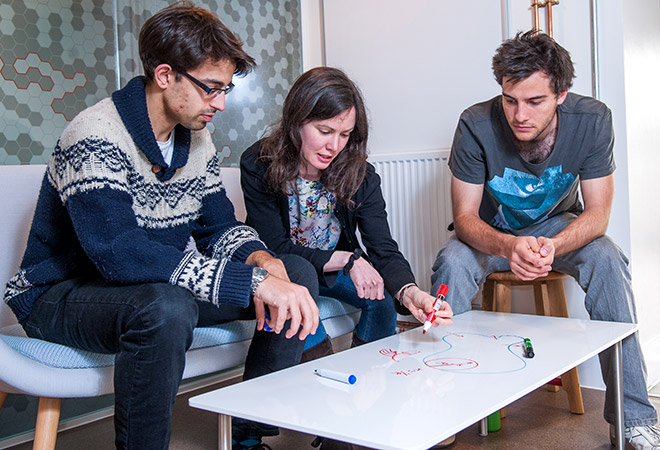 Students working together around a table