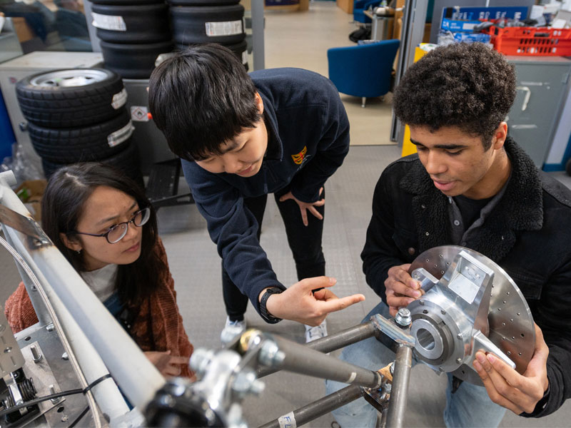 Formula 1 Scholar Sean (right) works alongside his classmates on the MEng in Engineering Science. Photo by John Cairns