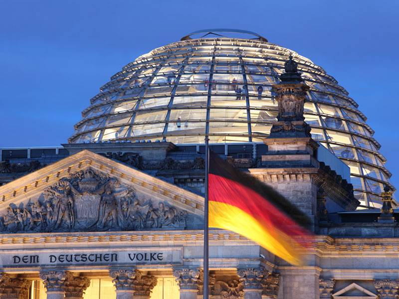 Detail of the Reichstag in Berlin, home of the German parliament, at dusk. Photo by Thomas Saupe