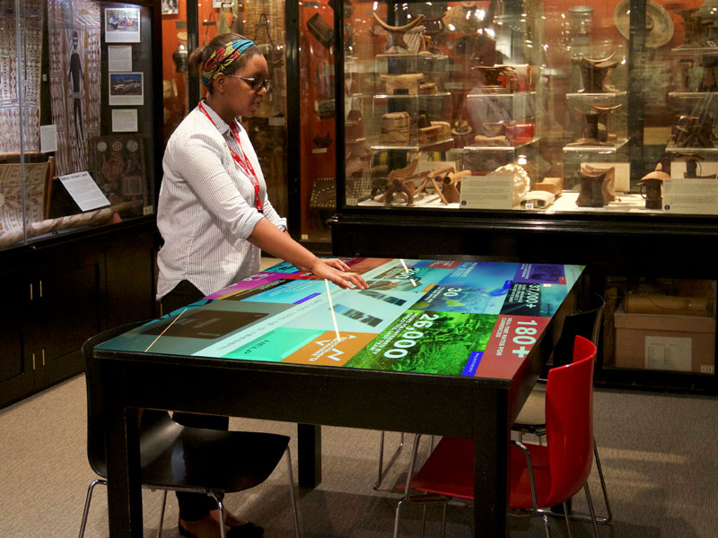 An interactive table at the Pitt Rivers Museum