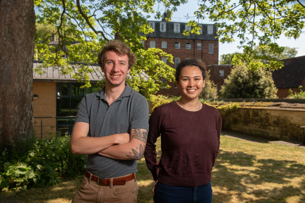 Ertegun scholars David Bell and Debbie Chow in the garden of Ertegun House