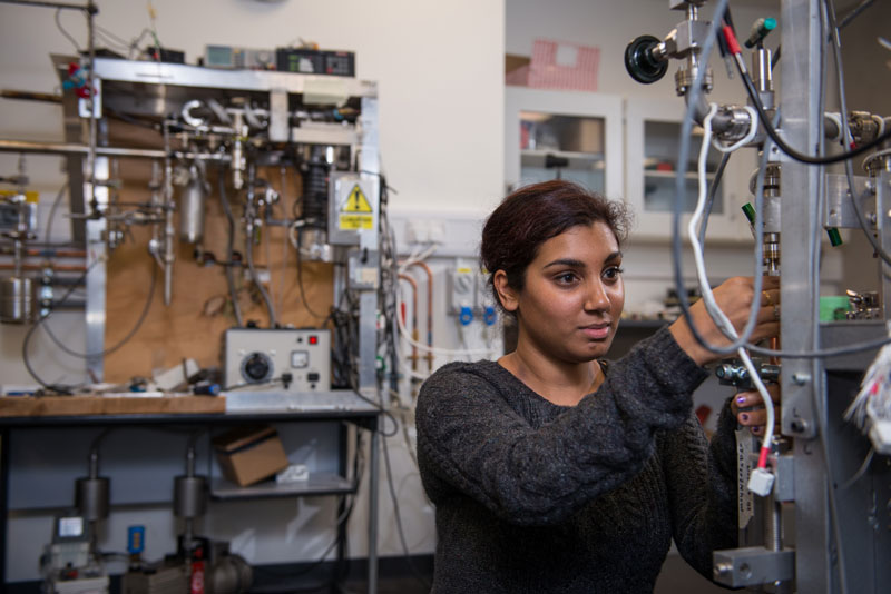 Researcher in Noble Lab. Photo by John Cairns