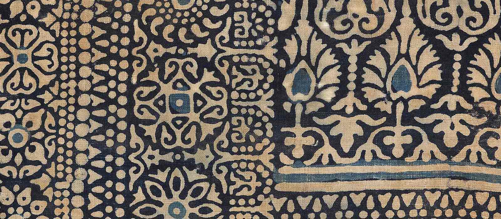 A black and blue block-printed Gujarati cotton textile fragment from the Ashmolean Museum’s collections