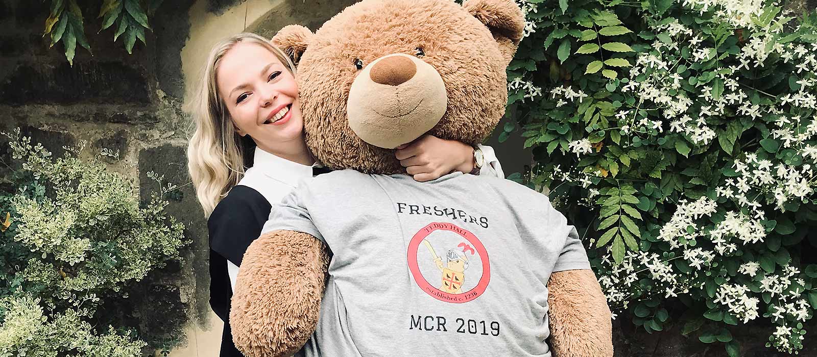 Saven Scholar Triin Ojakaar with the St Edmund Hall MCR teddy bear mascot