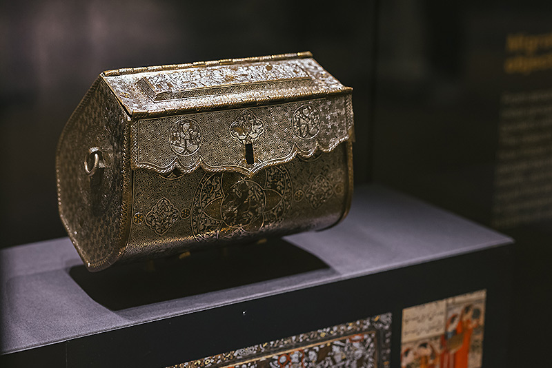 
A metal handbag from Iraq sitting inside a display cabinet in the History of Science Museum's Islamic Metalwork exhibition
