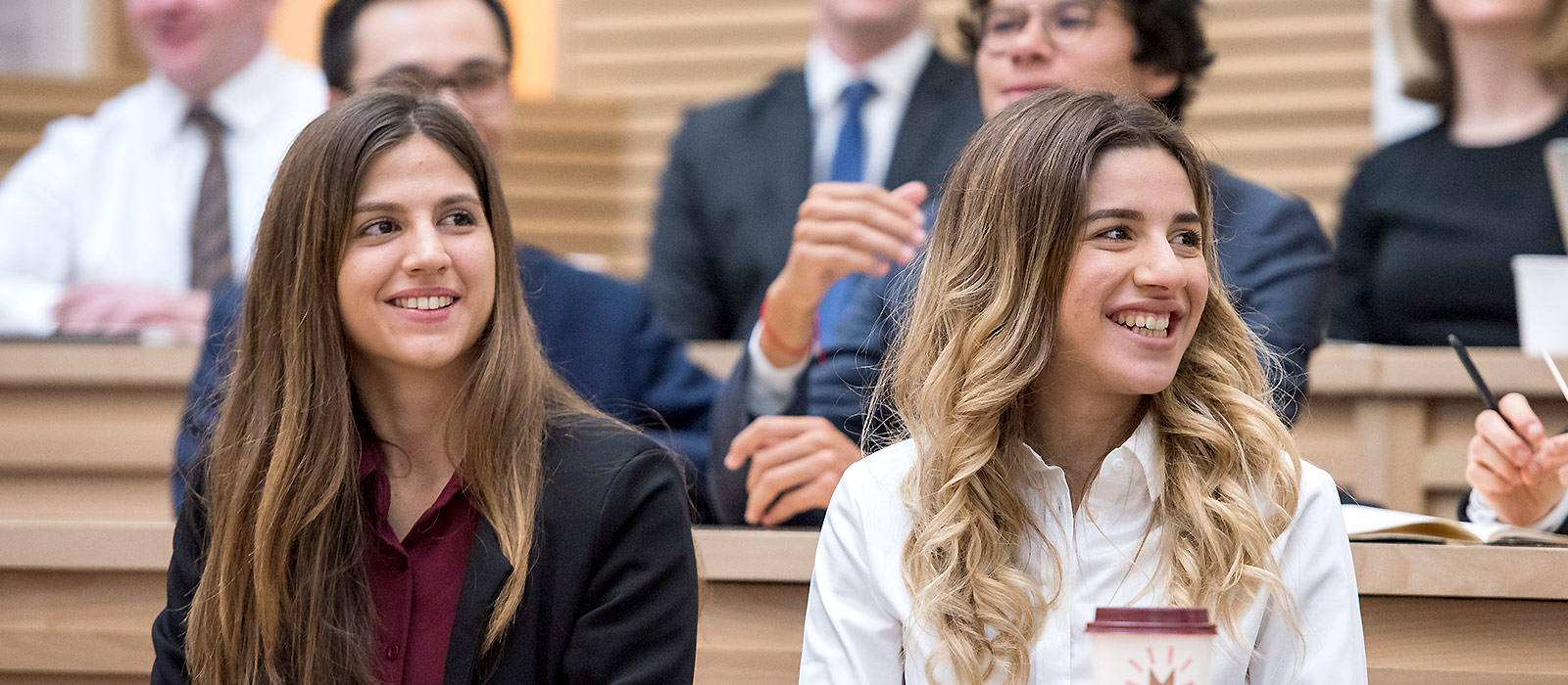 Graduate students in a lecture theatre in the Faculty of Law