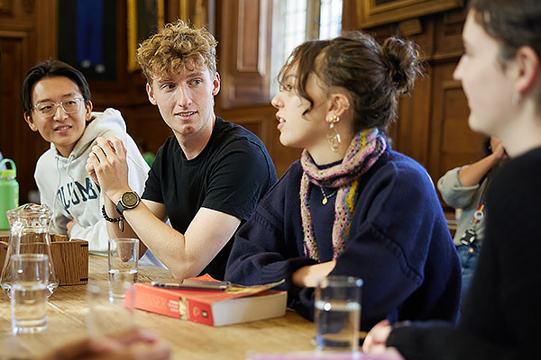 Students talking a college dining hall