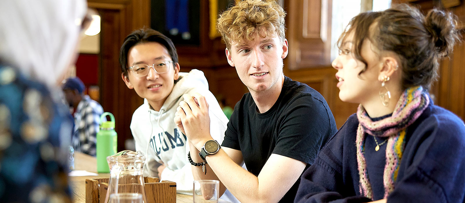 Students talking in a college dining hall