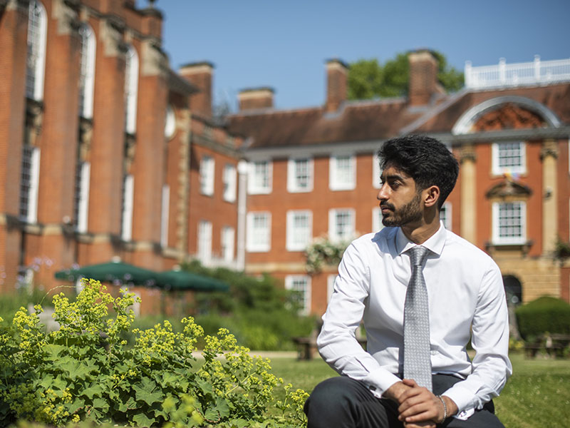 Usama Salamat in the grounds of Lady Margaret Hall