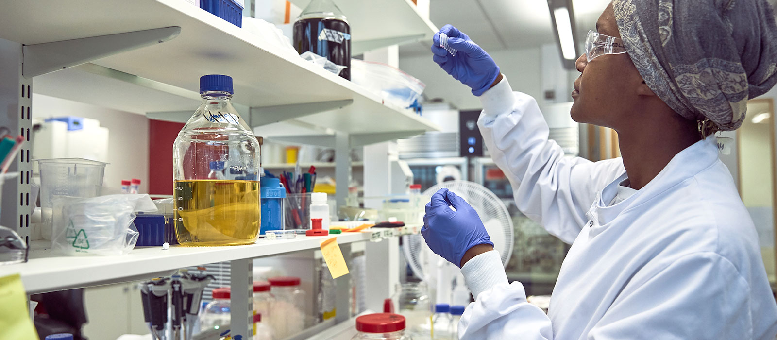 A scientist conducting research in a lab in the Department of Oncology