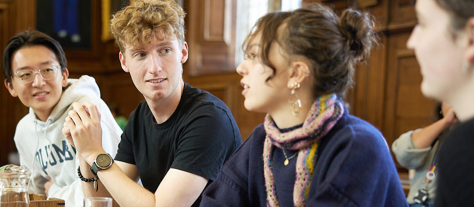 Students talking in a college dining hall